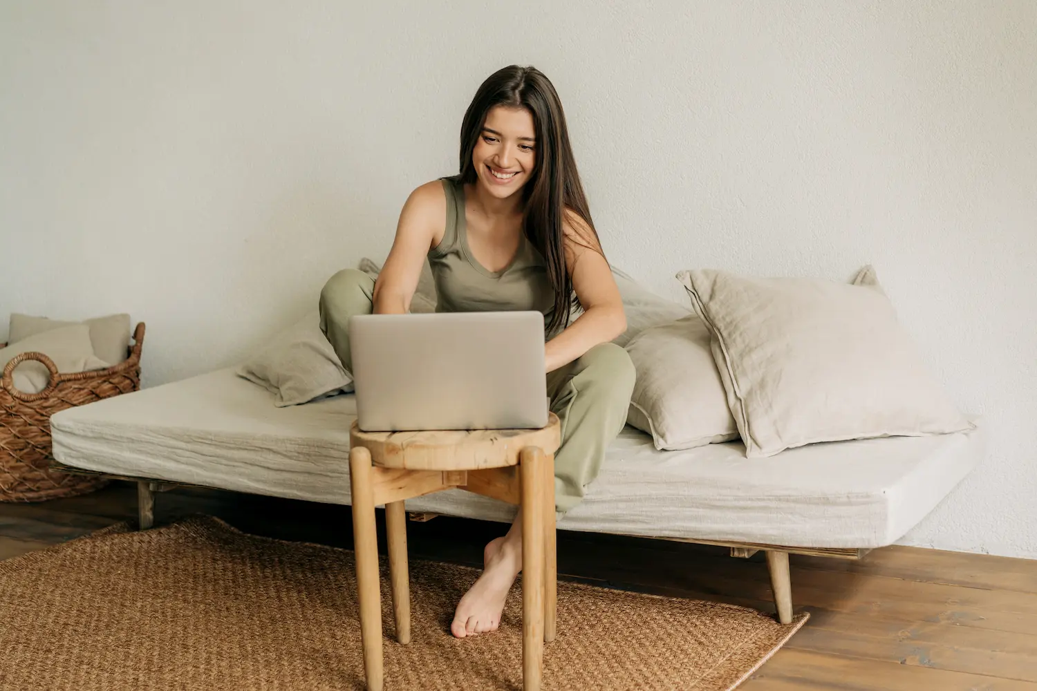 Happy woman receiving an email about her pending name change.